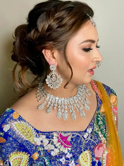 A view of the intricate braided updo, which adds a touch of modern elegance to the traditional look.