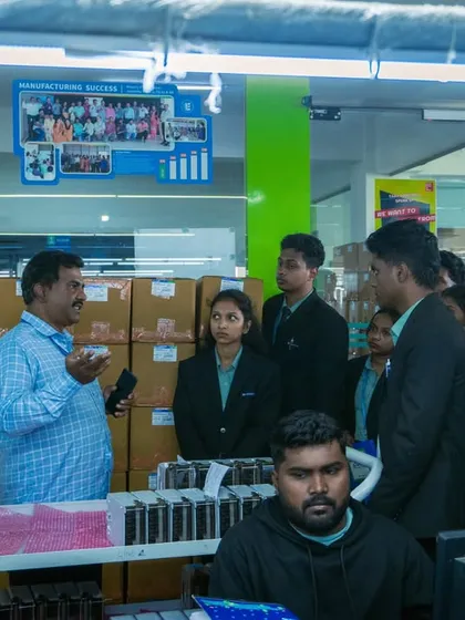Students observing the manufacturing process in our production facility. Seeing technology in action helps them connect theoretical knowledge with practical application.