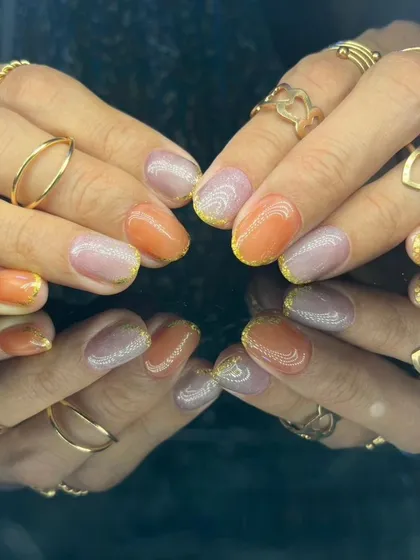 Another angle of the warm-toned glittery manicure.
