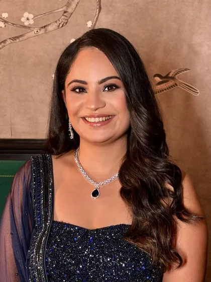 My client Shweta looking beautiful for a party. The sparkly blue smokey eye complements her navy blue outfit perfectly.
