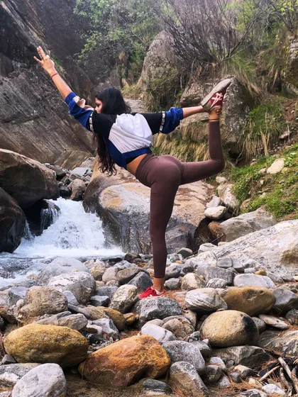 I believe in taking our practice beyond the mat and into the wild. Finding my balance in Natarajasana next to a rushing waterfall in the mountains is a reminder of nature's powerful, flowing energy.