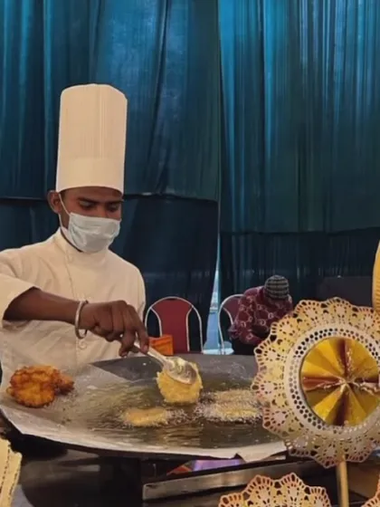 The magic happens right before your eyes. Here, one of our chefs prepares a fresh chaat dish on a live tawa, filling the air with delicious aromas and giving guests a theatrical culinary experience.