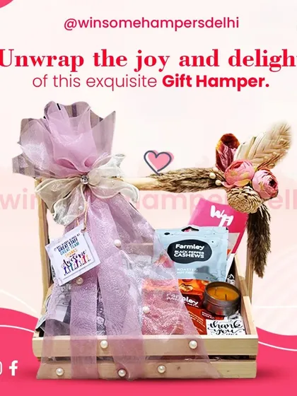 Unwrap the joy and delight of this exquisite gift hamper. Wrapped in pink tulle and pearls, it contains premium cashews and a scented candle for a touch of elegance.