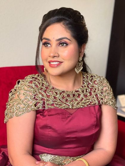 Sowmya looking bright and happy in her party-ready makeup. The look is designed to be both elegant and eye-catching.