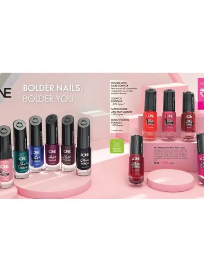 A product lineup for 'The ONE' nail polish collection, showcasing a variety of shades. The soft pink, multi-level staging creates a clean and feminine aesthetic perfect for beauty retail.
