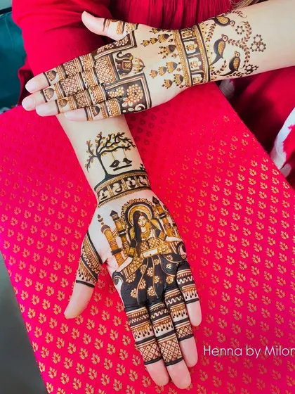 A unique design featuring a goddess figure, representing strength and divinity. The back of the hands have complementary designs with birds and trees.
