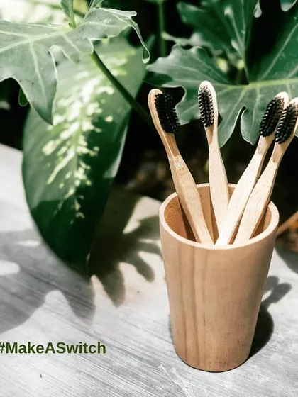 Make a simple switch with our bamboo toothbrushes. Set against a natural green backdrop, these toothbrushes feature biodegradable bamboo handles and charcoal-infused bristles, representing a small but significant step away from plastic waste.