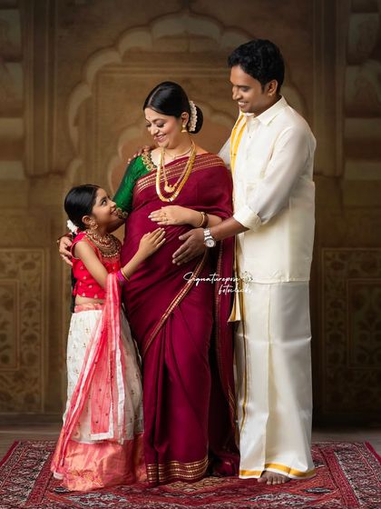 Awaiting the new arrival with love. This elegant, traditionally styled maternity portrait includes the whole family, celebrating the anticipation and the bond you already share.