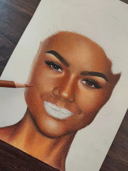 The beginning stages of a colored pencil portrait of Zendaya. Here, I've focused on building up her skin tone, leaving the hair and lips to be detailed later.