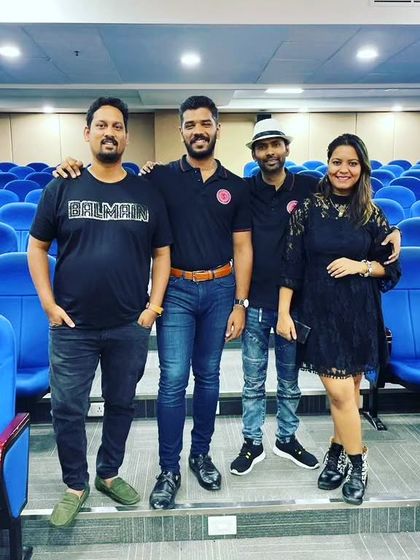 The band with a representative from Spardha Global after our performance at Narayana Health.