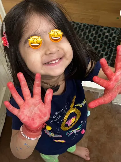 Messy hands, happy heart. This picture perfectly captures the joyful, hands-on spirit of our workshops.