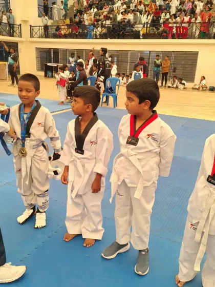 A proud moment for these young champions as they receive their medals at a local Taekwondo tournament. Their focus and determination are inspiring.