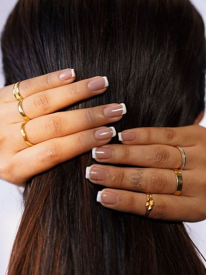 A beautiful composition of our delicate gold rings, showcasing their versatility and everyday elegance.