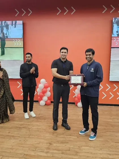 Various moments capturing Pullela Gopichand's presence at our events, interacting with partners, students, and our team.