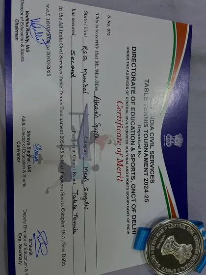 Our coach Akash Gupta on the podium after securing the runner-up position in the Men’s Singles at the All India Civil Services Table Tennis Tournament 2024-25.