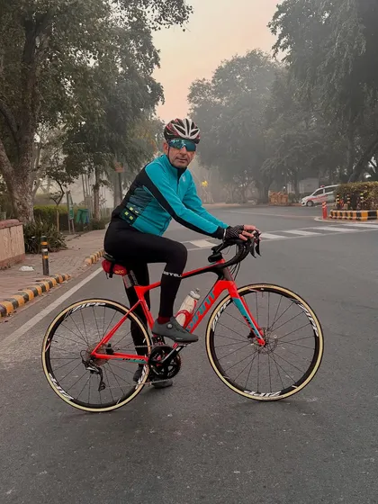 Getting into position on the bike, ready to start the ride.