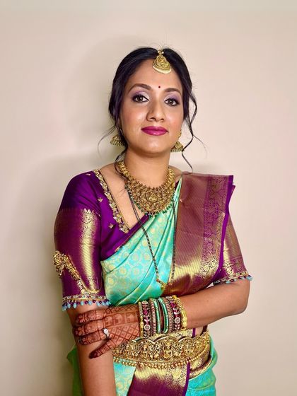 A confident and glamorous reception look. The makeup is polished and sophisticated, perfect for an evening celebration.