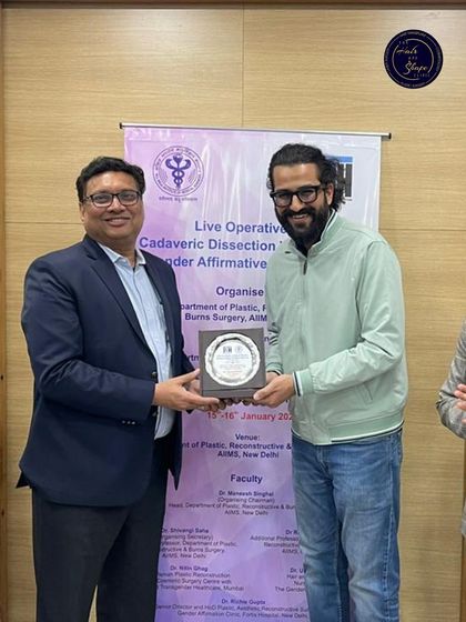 Receiving a token of appreciation at the AIIMS workshop. Collaborating with the best minds in the country helps push the boundaries of what's possible in reconstructive surgery.