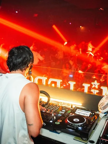 A view from behind the decks at Millers, showing the packed, high-energy dance floor. This is the result I deliver.