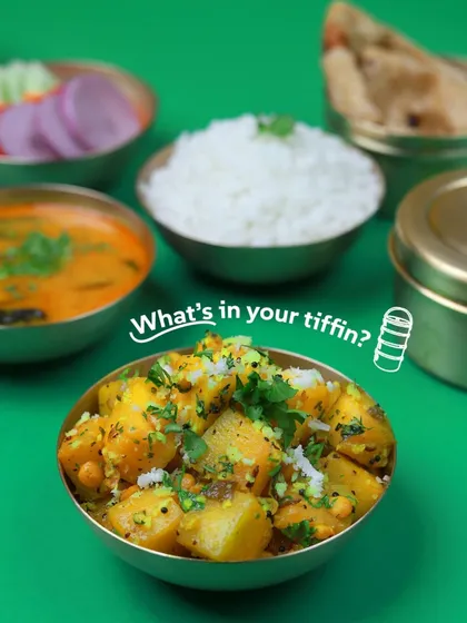 What's in your tiffin? A balanced, fresh, and delicious meal from us. This image shows a tasty pumpkin sabzi ready to be enjoyed.