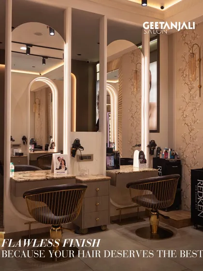 An oasis of elegance and indulgence. The salon interior, with its arched mirrors and sophisticated chairs, is designed to make you feel your best.