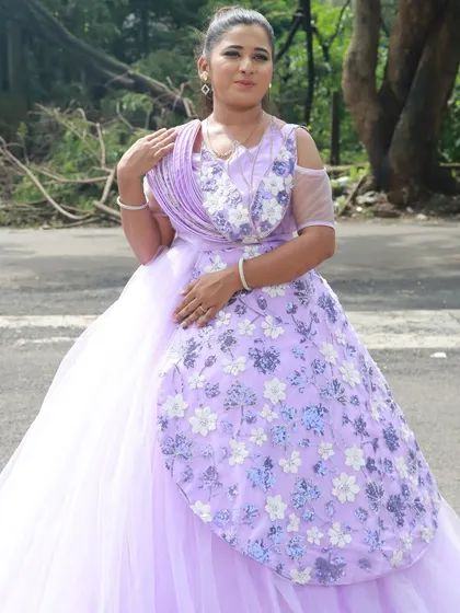 An elegant lavender gown paired with soft, romantic makeup. This is a perfect example of the event-ready looks our students learn to create.