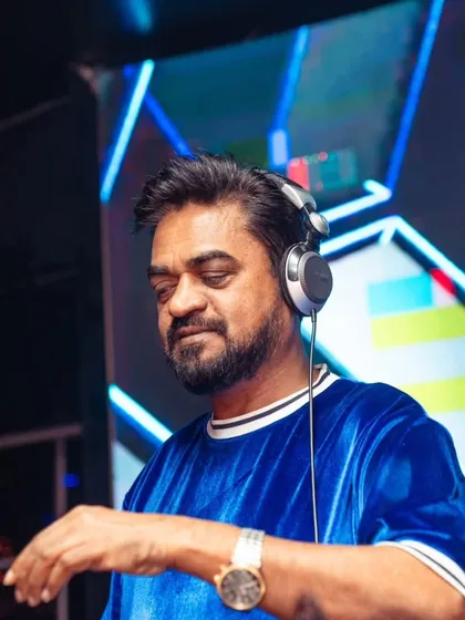 In the zone. This is my office, where I mix tracks and read the crowd to create an unforgettable night. Whether it's a club in Bangalore or a private party in Hyderabad, my focus is always on the music.