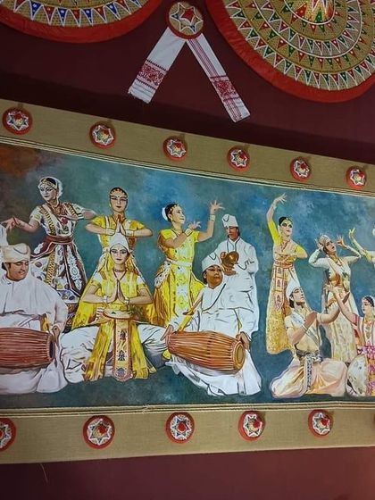 A close-up of one of the large paintings I created for the pandal, depicting traditional Assamese Bihu dancers and musicians.