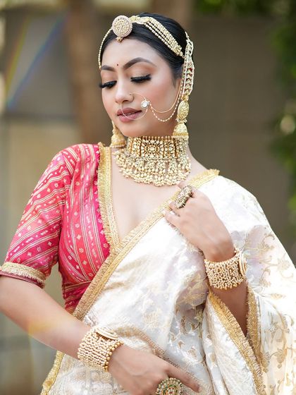 A beautiful portrait with eyes closed, showcasing the soft and blended eyeshadow and the flawless base.