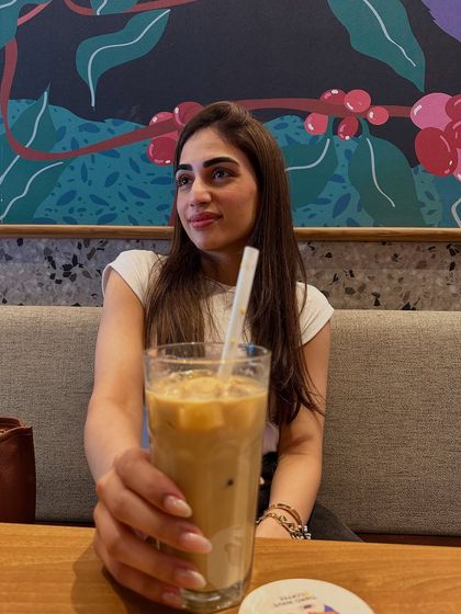 A happy moment, offering a sip of my iced coffee. It’s the little things that make a day better.