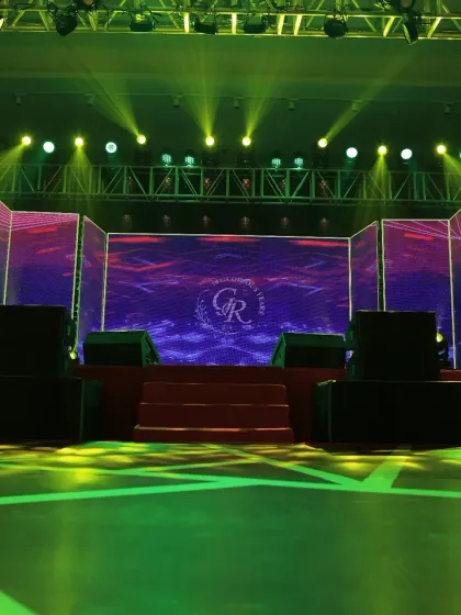 The stage is set for a night of entertainment. With a large LED screen for custom visuals and a professional lighting setup, this stage was the heart of the celebration, ready for performances and speeches.