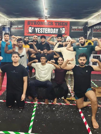 The team flexing after a birthday celebration. We work hard and celebrate our milestones together.