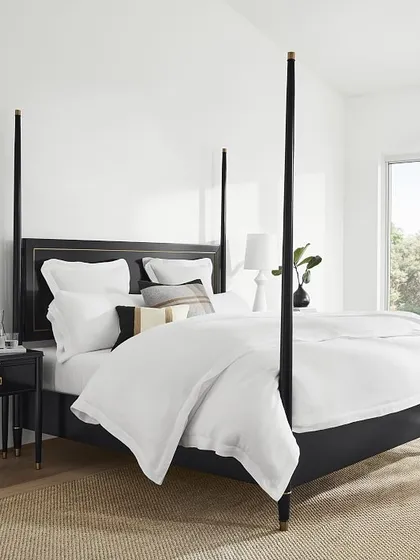 Inspired by the elegant restraint of 1940s French furnishings, our Los Angeles four-poster bed is impeccably crafted. The headboard, posts, and feet are detailed in brass for a warm contrast, while a semi-glossy lacquer finish lends polish and sophistication.
