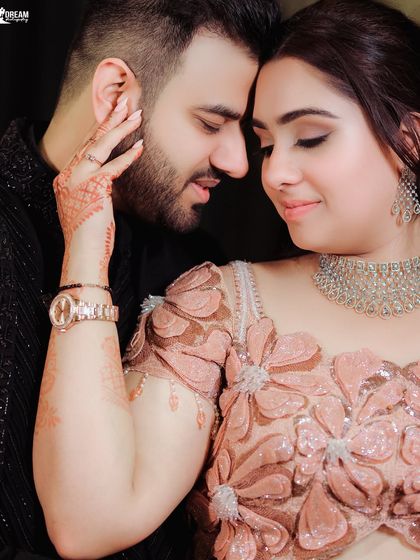 A close-up, intimate portrait from a Roka ceremony. I focus on the details, like the henna on her hands and the soft expressions, to tell a deeper story.