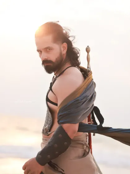 A male warrior concept shoot on the beach. Using the natural landscape and strong, directional light, I created a series of intense and heroic portraits of an actor, complete with a sword and styled costume.