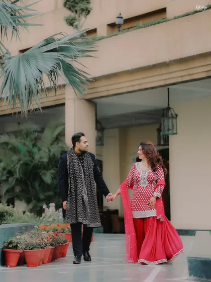 The couple walking hand in hand after their Roka. This classic shot is all about capturing the beginning of their new journey together.
