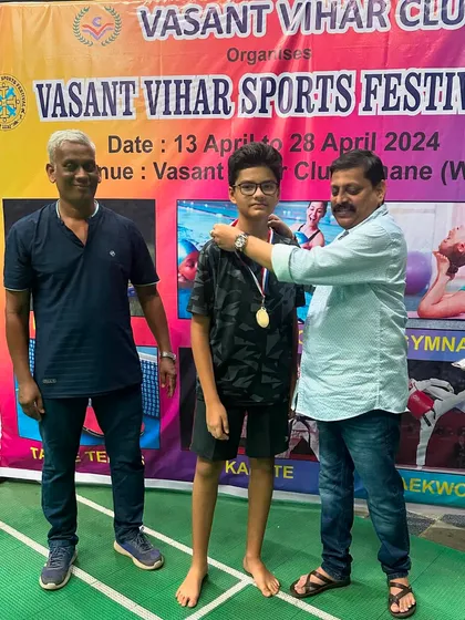 Boys U-15 runner-up Aditya Dighe with his medal and certificate.