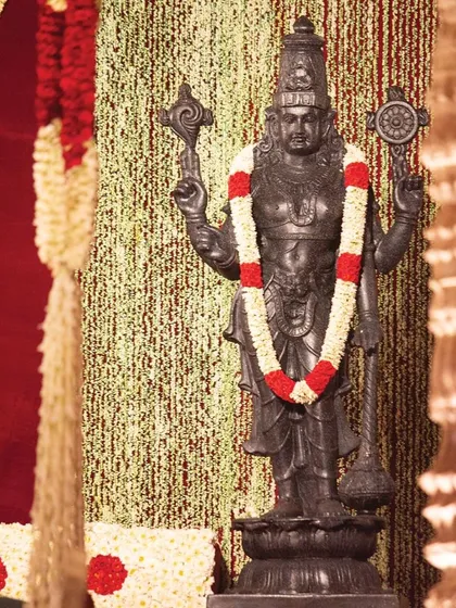 Flanking the central deity are Jaya and Vijaya, the divine gatekeepers. These intricately crafted sculptures embody strength and devotion, enhancing the sanctity of the space and offering protective blessings.