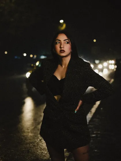 A moody, high-contrast shot from a night shoot in the city. This shows my ability to create strong, editorial-style images that build a specific atmosphere for a fashion brand's campaign.