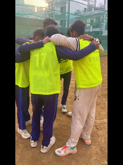 Another team huddle, showing the unity and focus of our players. Together, we rise.