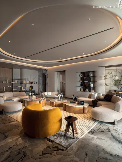 This living room in a modern-minimalist apartment at Palais Royale unfolds as a serene sanctuary, elevated by panoramic views of the Arabian Sea. Defined by a monochrome palette and softened with tempest white marble, the space sets a soothing tone where structure and soul coexist beautifully.