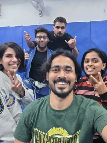 Peace signs and smiles after a great session focusing on self-defense applications.