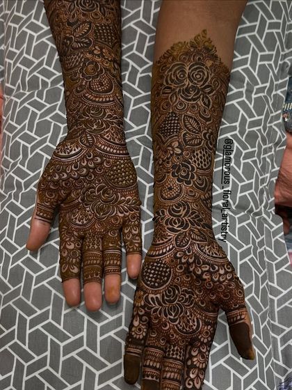 This full-coverage design showcases my signature floral work, with large roses and leafy vines creating a bold and glamorous statement.