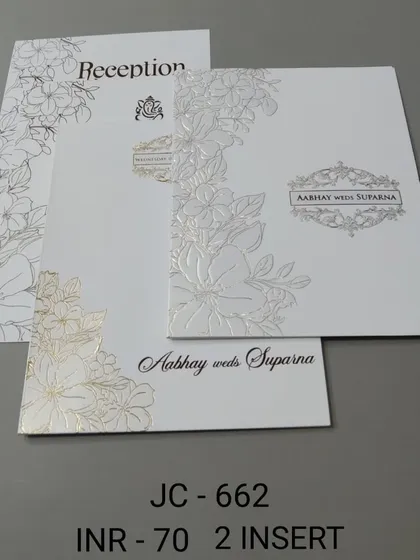 This card is for those who appreciate minimalist design. It features clean silver and gold foil line art of flowers on a crisp white background, offering a modern and sophisticated way to invite your guests.