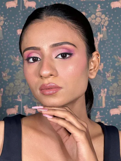 Rosy hues and dreamy views. This pink eye look is feminine and modern, especially when paired with a sleek ponytail and glossy lips.
