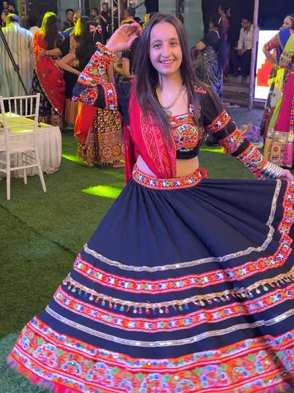 A close up shot showing the beautiful details of my Garba outfit. I believe that the visual appeal of costumes adds significantly to the overall festive atmosphere of a Navratri night.