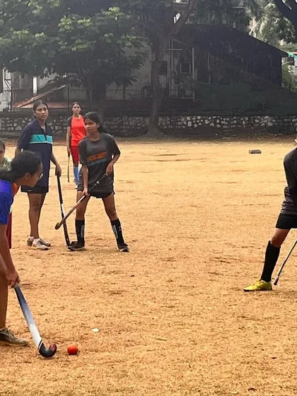 Our girls practicing on a dirt field, showing their adaptability and love for the game, no matter the surface. This drill focuses on passing and positioning.