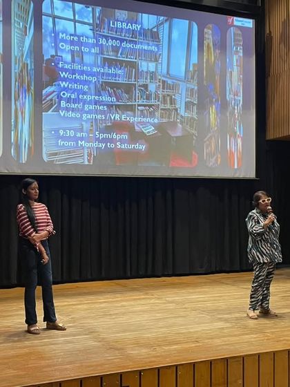 An orientation session for new students in our auditorium. A presentation about our library's extensive facilities and resources is a key part of their welcome.