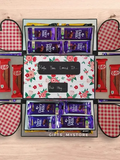 A surprise phone gift for a husband, hidden inside a beautiful chocolate explosion box. This was a custom order to combine his love for tech and chocolate.