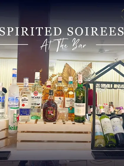 A spirited soiree at the bar. This image showcases a well-stocked bar with a wide variety of premium liquors and wines, ready to cater to every guest's preference.